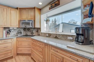 Photo 15: 235 Silvercreek Drive NW in Calgary: Silver Springs Detached for sale : MLS®# A2028271