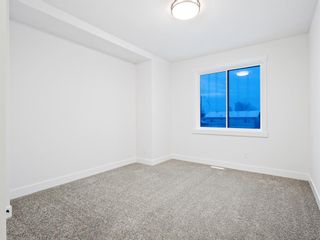 Photo 29: 1406 43 Street SW in Calgary: Rosscarrock Semi Detached (Half Duplex) for sale : MLS®# A2022500