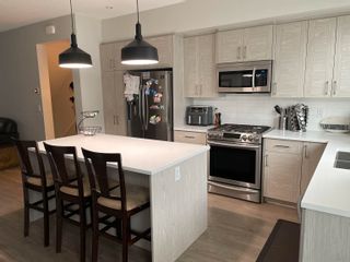 Photo 10: 3 8371 202B Street in Langley: Willoughby Heights Townhouse for sale in "Kensington Lofts" : MLS®# R2678894
