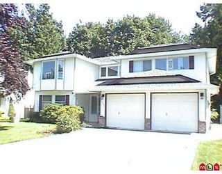 Photo 1: 7442 142ND Street in Surrey: East Newton House for sale in "Nichol Creek" : MLS®# F2720770