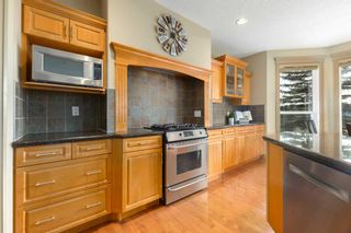 Photo 16: 29 Strathlea Court SW in Calgary: Strathcona Park Detached for sale : MLS®# A2127443