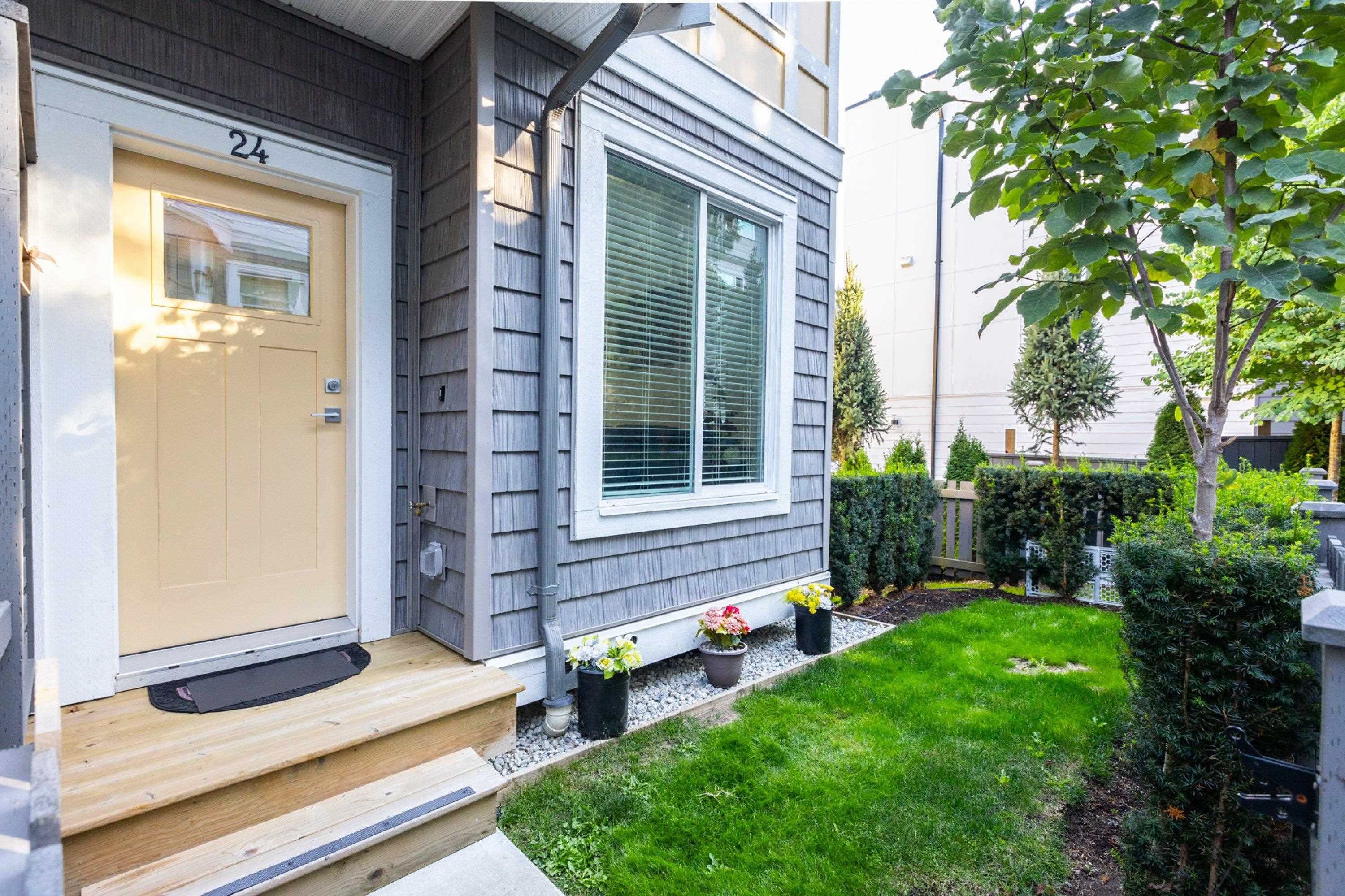 Main Photo: 24 9688 162A Street in Surrey: Fleetwood Tynehead Townhouse for sale in "CANOPY LIVING" : MLS®# R2818118
