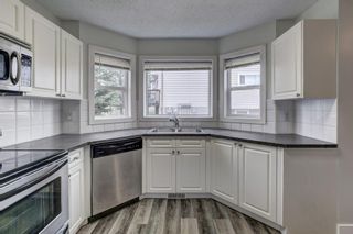 Photo 5: 9 Sandarac Way NW in Calgary: Sandstone Valley Row/Townhouse for sale : MLS®# A2050563