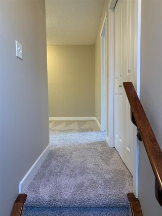 Photo 23: 384 Rockyspring Grove NW in Calgary: Rocky Ridge Row/Townhouse for sale : MLS®# A1231276