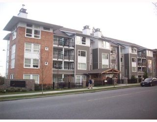 Photo 1: 409 6888 SOUTHPOINT Drive in Burnaby: South Slope Condo for sale in "THE CORTINA" (Burnaby South)  : MLS®# V760303