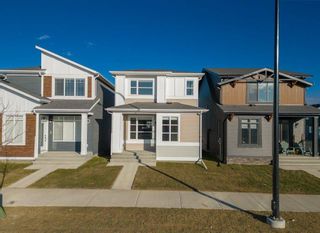 Photo 1: 44 Rowmont Drive NW in Calgary: C-483 Detached for sale : MLS®# A2096232