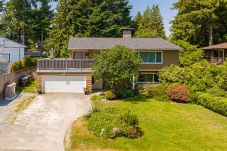 Photo 1: 1654 OUGHTON Drive in Port Coquitlam: Mary Hill House for sale : MLS®# R2790688