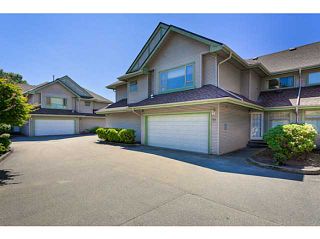 Photo 2: # 58 1255 RIVERSIDE DR in Port Coquitlam: Riverwood Townhouse for sale in "RIVERWOOD GREEN" : MLS®# V1019194