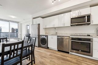 Photo 2: 911 450 8 Avenue SE in Calgary: Downtown East Village Apartment for sale : MLS®# A2116469