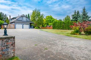 Photo 2: 7591 150A Street in Surrey: East Newton House for sale : MLS®# R2599996