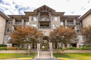 Photo 1: 307 12268 224 Street in Maple Ridge: East Central Condo for sale in "STONEGATE" : MLS®# R2802196