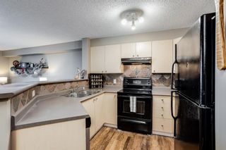 Photo 4: 6312 304 Mackenzie Way SW: Airdrie Apartment for sale : MLS®# A1169316