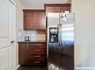 Photo 7: 2212 130 Panatella Street NW in Calgary: Panorama Hills Apartment for sale : MLS®# A1216369