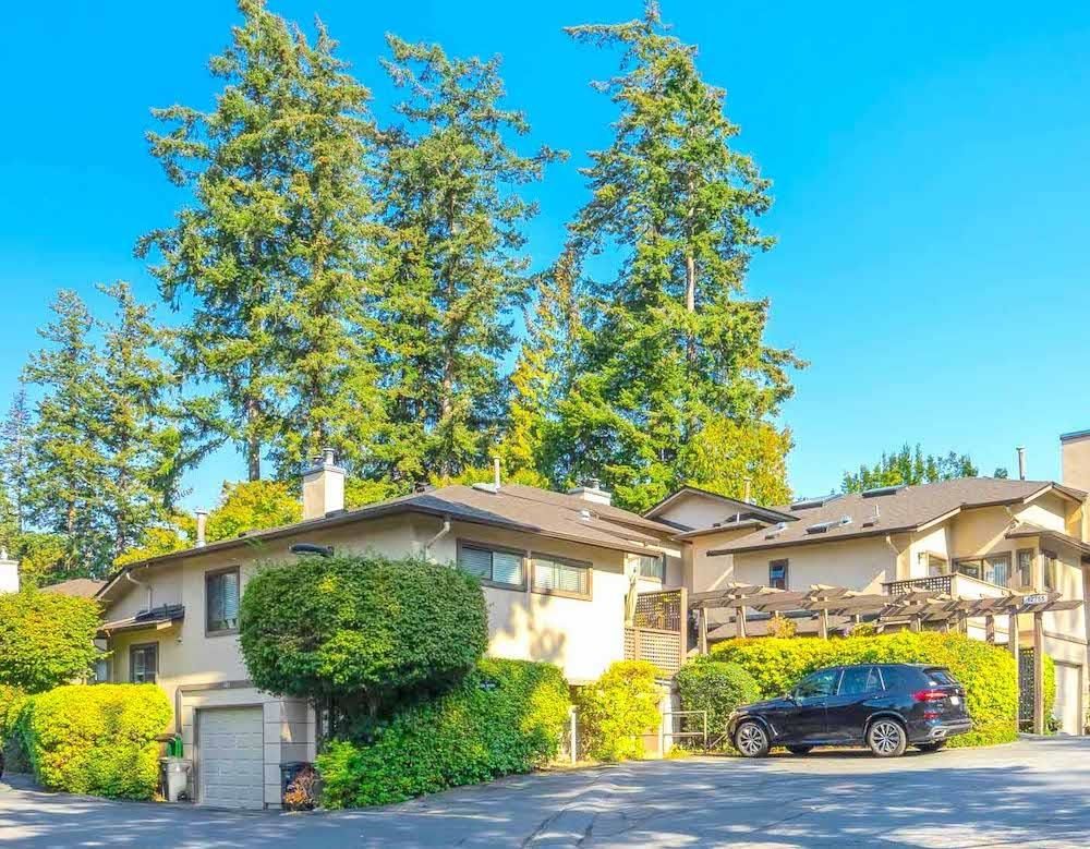 Main Photo: 102 12755 16 Avenue in Surrey: Crescent Bch Ocean Pk. Townhouse for sale in "Courtyards at Ocean Park" (South Surrey White Rock)  : MLS®# R2729944