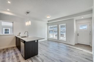 Photo 7: 139 Spring Creek Common SW in Calgary: Springbank Hill Row/Townhouse for sale : MLS®# A2021017