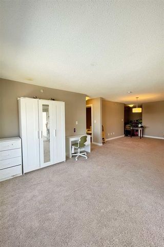 Photo 1: 402 7210 80 Avenue NE in Calgary: Saddle Ridge Apartment for sale : MLS®# A2001799