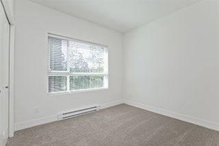 Photo 17: 102 33568 GEORGE FERGUSON Way in Abbotsford: Central Abbotsford Condo for sale in "The EDGE" : MLS®# R2568787
