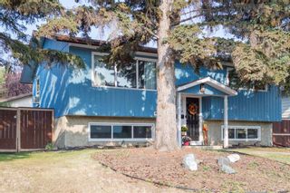 Photo 1: 240 Queen Charlotte Way SE in Calgary: Queensland Detached for sale : MLS®# A2001881