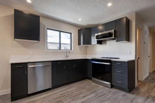 Photo 1: B 419 Marten Street: Banff Semi Detached (Half Duplex) for sale : MLS®# A2095606