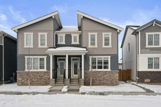 Main Photo: 147 Carringham Road NW in Calgary: Carrington Semi Detached (Half Duplex) for sale : MLS®# A2106316