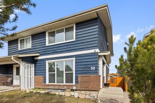 Photo 1: 32 Midridge Gardens SE in Calgary: Midnapore Semi Detached (Half Duplex) for sale : MLS®# A2121092