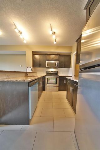 Photo 11: 203 117 19 Avenue NE in Calgary: Tuxedo Park Apartment for sale : MLS®# A2004116