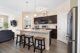 Photo 4: 207 1 Crystal Green Lane: Okotoks Apartment for sale : MLS®# A2124336