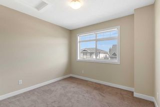 Photo 22: 125 Panatella Road NW in Calgary: Panorama Hills Row/Townhouse for sale : MLS®# A2074246
