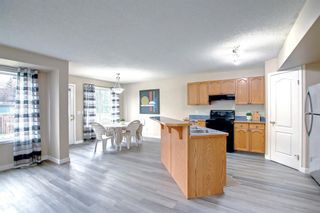 Photo 11: 104 Panamount Heights NW in Calgary: Panorama Hills Detached for sale : MLS®# A2004311