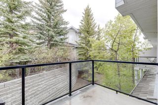 Photo 27: 129 Rocky Vista Terrace NW in Calgary: Rocky Ridge Row/Townhouse for sale : MLS®# A1230621