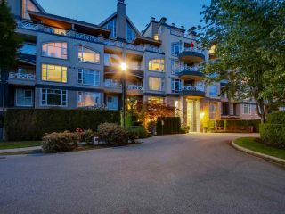 Photo 1: 108 3600 WINDCREST Drive in North Vancouver: Roche Point Townhouse for sale in "WINDSONG AT RAVEN WOODS" : MLS®# R2067772