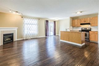 Photo 5: 23 TUSCARORA WY NW in Calgary: Tuscany House for sale : MLS®# C4174470