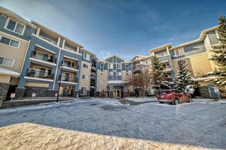 Photo 1: 404 120 Country Village Circle NE in Calgary: Country Hills Village Apartment for sale : MLS®# A2117510