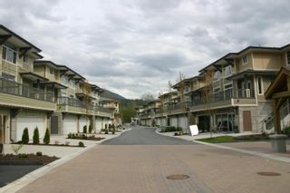 Main Photo: 56 40632 GOVERNMENT Road in Squamish: Brackendale Townhouse for sale in "RIVERSWALK" : MLS®# R2792772