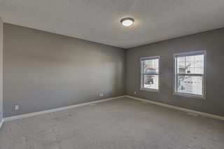 Photo 11: 32 Everwillow Green SW in Calgary: Evergreen Detached for sale : MLS®# A1188019