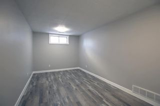 Photo 38: 102 Winston Drive SW in Calgary: Westgate Detached for sale : MLS®# A2012680