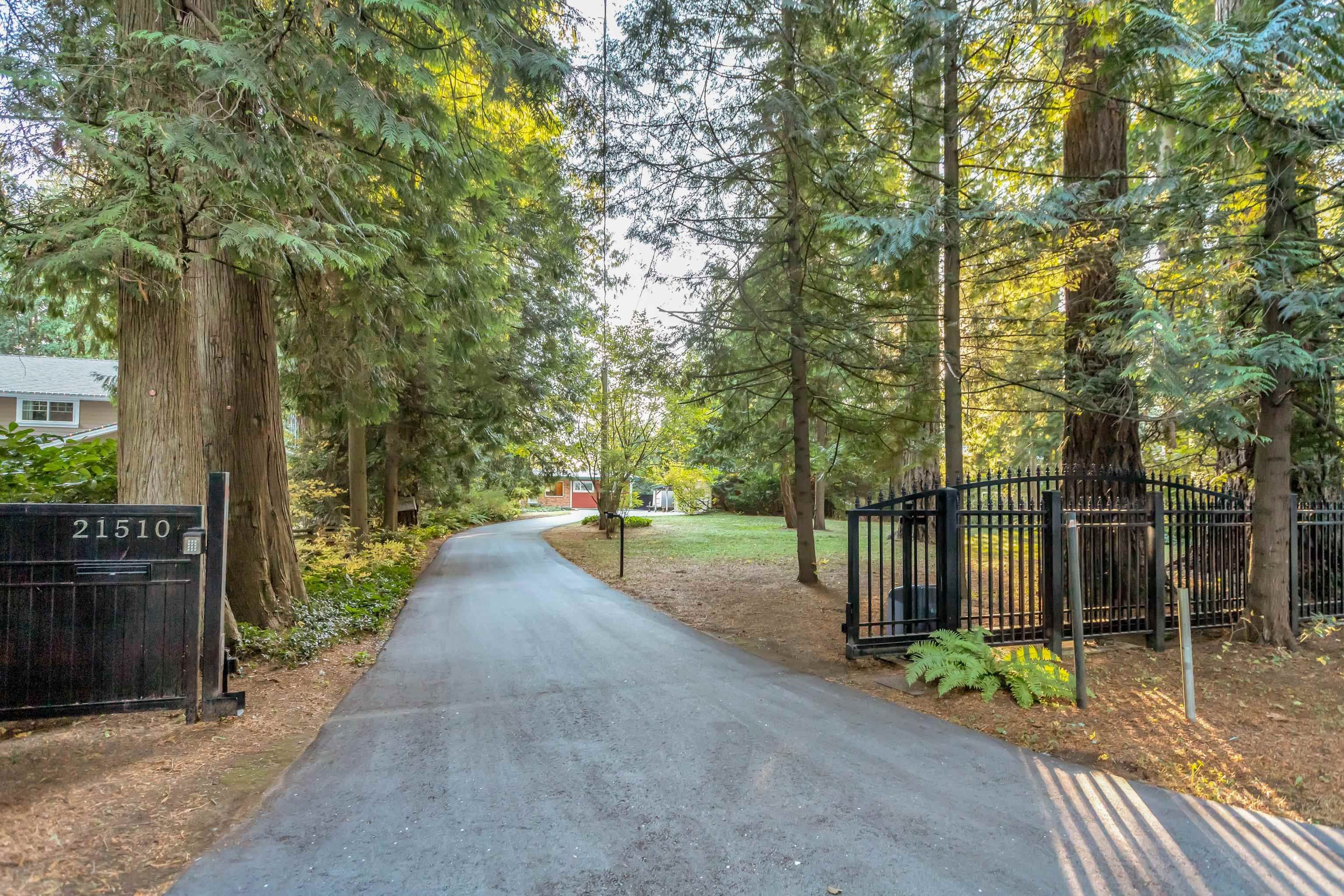 Gated entry to your private flat 3/4 acre estate on Shady Lane- on city water and sewer