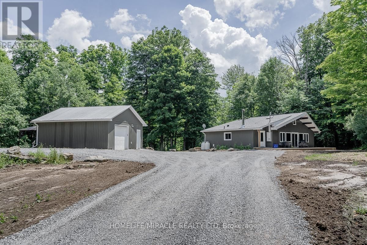 Main Photo: 2221/23 COUNTY ROAD 620 RD in North Kawartha: House for sale : MLS®# X5989592