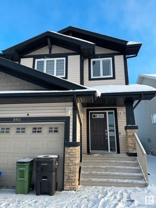 Photo 2: 9911 217 Street in Edmonton: Zone 58 House Half Duplex for sale : MLS®# E4368087