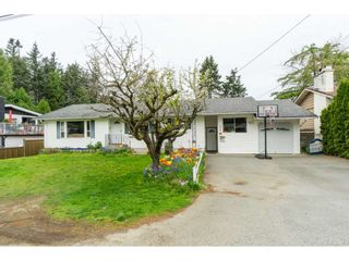 Photo 1: 33329 RAINBOW Avenue in Abbotsford: Abbotsford West House for sale in "Hoon Park" : MLS®# R2452789