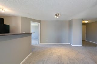 Photo 6: 8329 304 MACKENZIE Way SW: Airdrie Apartment for sale : MLS®# A1128736