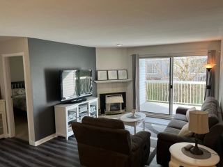 Photo 2: 108 5379 205 Street in Langley: Langley City Condo for sale in "Heritage Manor" : MLS®# R2758341