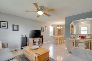 Photo 6: 503 QUEEN CHARLOTTE Road SE in Calgary: Queensland Detached for sale : MLS®# A1029461