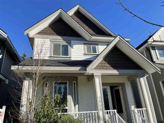Photo 1: 5968 131 Street in Surrey: Panorama Ridge House for sale : MLS®# R2526365
