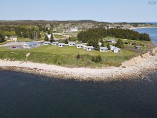 Photo 6: 36083 Cabot Trail Highway in Ingonish: 209-Victoria County / Baddeck Multi-Family for sale (Cape Breton)  : MLS®# 202312326