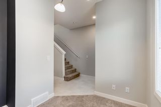 Photo 8: 2303 Jumping Pound Common: Cochrane Row/Townhouse for sale : MLS®# A2012972