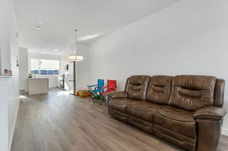 Photo 11: 113 101 Panatella Square NW in Calgary: Panorama Hills Row/Townhouse for sale : MLS®# A2053584