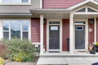 Photo 3: 214 Panatella Walk NW in Calgary: Panorama Hills Row/Townhouse for sale : MLS®# A1225557