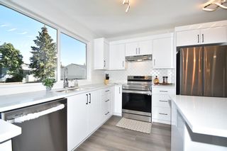Photo 9: 206 Oakmoor Place SW in Calgary: Oakridge Detached for sale : MLS®# A2006049