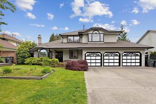 Photo 1: 5860 188 Street in Surrey: Cloverdale BC House for sale in "ROSEWOOD PARK" (Cloverdale)  : MLS®# R2698962